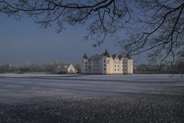 fairytale water castle in beautiful winter landscape, Glücksburg Castle, Schleswig Holstein,...