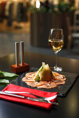 Gourmet fish dish. Restaurant table setting.