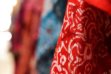 Fabric and cashmere scarfs in Acre, Akko, market with spices and local Arabic products, North Israel