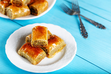 Turkish dessert baklava on wooden background