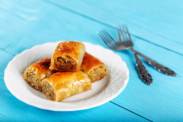 Turkish dessert baklava on wooden background