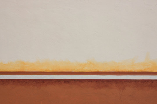 Textura de pared vieja blanco, amarillo y café.