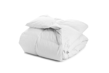 Folded soft blanket on white background. Textile for bedroom interior