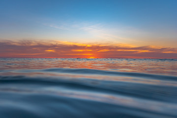 big waves in beautiful sunset big waves in beautiful sunset