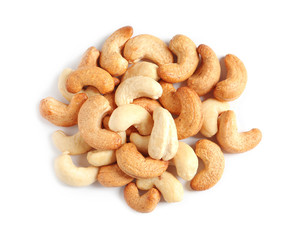 Tasty cashew nuts isolated on white, top view