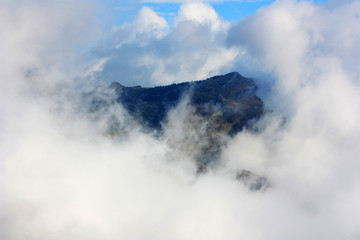 Naklejka na ściany i meble Fog on Mount Baldo, Italy