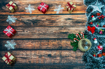 Christmas decoration and Christmas gifts on wooden background. Christmas background, with place for text, copy space.