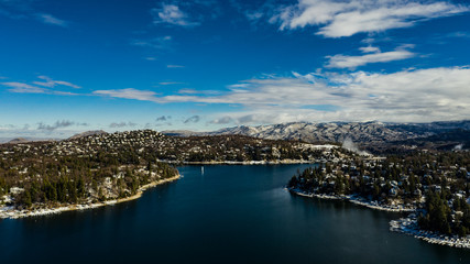 Aerial, drone view of Lake Arrowhead, California on a winter's day after a snow storm