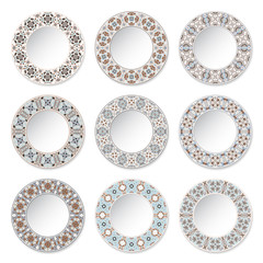 Set of nine decorative plates with a circular colored pattern, top view. White background. Vector illustration.