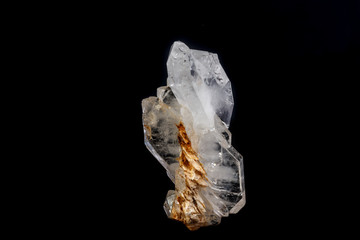 Macro mineral stone Flattened crystal of rock crystal on a black background