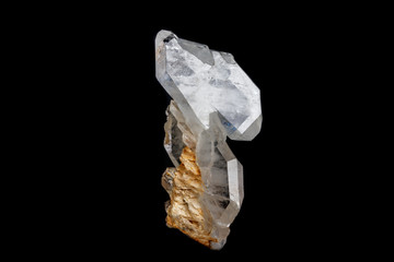 Macro mineral stone Flattened crystal of rock crystal on a black background