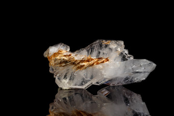 Macro mineral stone Flattened crystal of rock crystal on a black background