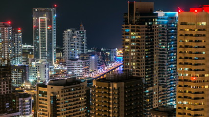 Beautiful aerial top view at night timelapse of Dubai Marina in Dubai, UAE