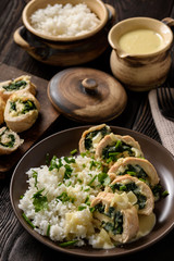Spinach and mozzarella stuffed chicken fillet baked in oven.
