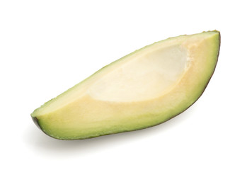 Slice of avocado isolated