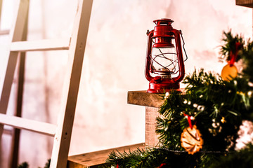 Christmas decoration card with vintage christmas toys tree branches kerosene oil lamp