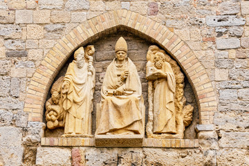 16 OCTOBER 2018, VOLTERRA, ITALY: Roman Pope statue at the cathedral wall