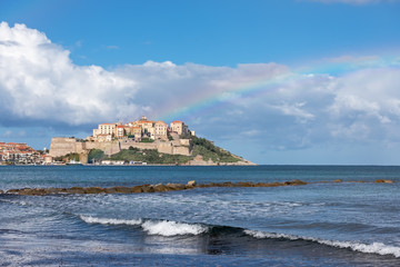 Obraz na płótnie Canvas Scenic view of the city of Calvi with a rainbow, Corsica, France