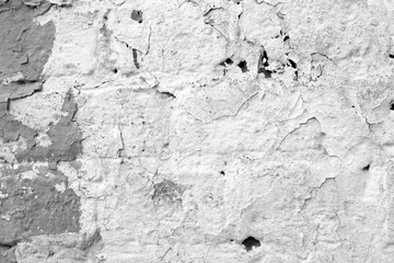 Crack Concrete Wall Background. Wall Paint Peeling. Cracked Flaked Shabby Wall With Rundown Stucco Layer Texture.