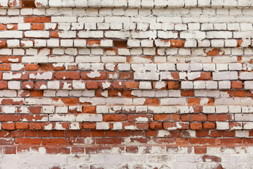 Grey Red White Wall Background. Old Grungy Brick Vertical Texture. Brick Wall With Layer Chop Stucco. Structure With Broken Plaster And Paint. Wall With Damage Surface. Old Grunge Abstract Background.
