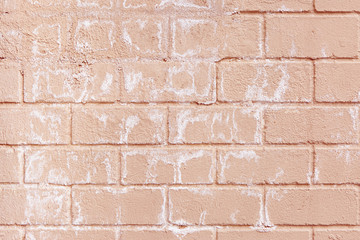Painted Pink Brick Wall With Salty Spots And Streaks. Pale Pastel Pink Peach Trendy Color Brick Wall Grunge Style Urban Design Wallpaper Background.