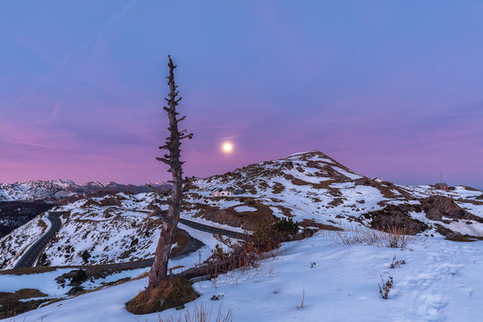 Full moon over Larra covered by snow in December