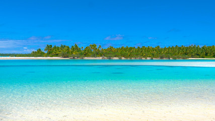 COPY SPACE: Crystal clear ocean water by tropical island glimmers in summer sun.