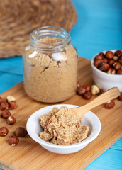 Hazelnut butter on wooden background