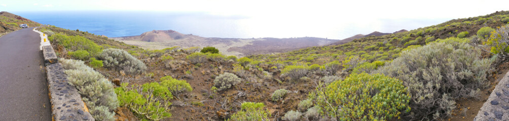 Extinct volcano rim visible above La Restinga village on El Hierro Island Canaries Spain