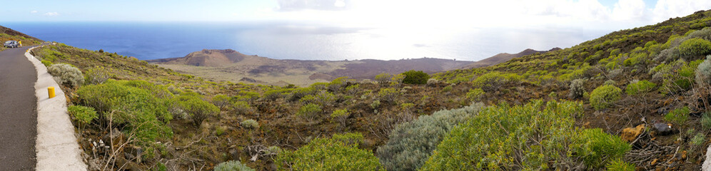 Extinct volcano rim visible above La Restinga village on El Hierro Island Canaries Spain