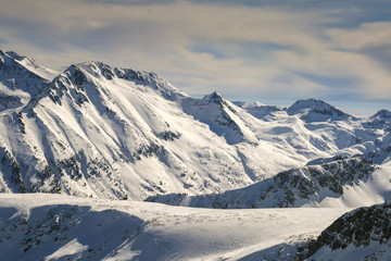 Winter landscape with hills covered with snow at Pirin Mountain, view from Todorka peak, Bulgaria