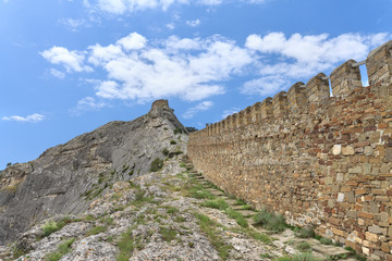 wall of ancient fortress / bright summer landscape travel Crimea