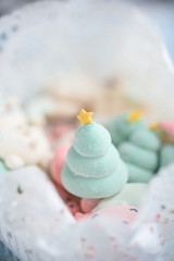 Tasty and beautiful marshmallows in the form of: Christmas trees, muzzles of pigs, snowmen,