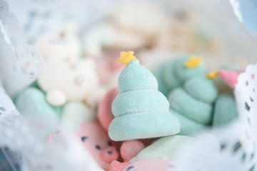 Tasty and beautiful marshmallows in the form of: Christmas trees, muzzles of pigs, snowmen,