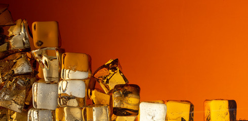 Close up view of the ice cubes in cola