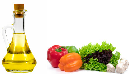 Lettuce, bell pepper and mushrooms and oil on a white background