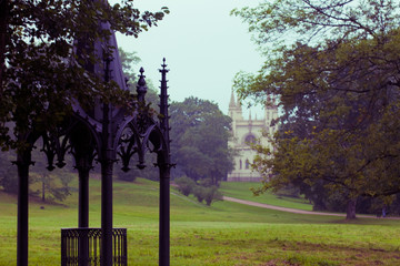 Mysterious landscape with a Gothic gazebo in the foreground.