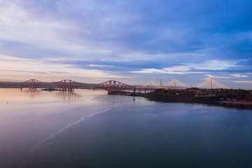 Three bridges, Forth railway Bridge, Forth Road Bridge and Queensferry Crossing, over Firth of Forth near Queensferry in Scotland
