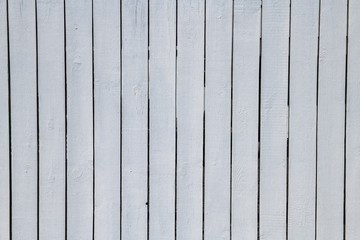 Białe, drewniane ogrodzenie. Tło z desek