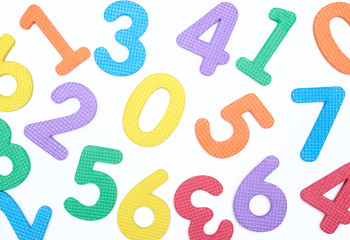 colored numbers on white background. the concept of the school. the child learns to count.