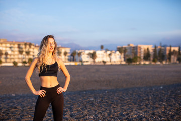 Woman doing sport at dawn