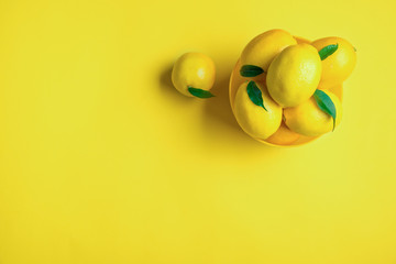 Lemon on yellow