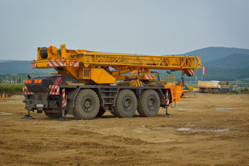 Obraz premium auto crane on construction site