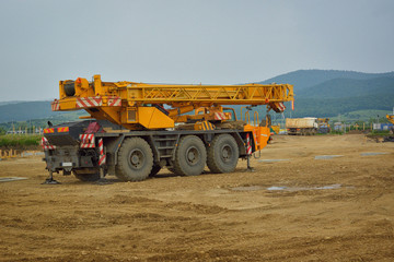 Obraz premium auto crane on construction site