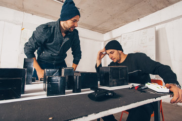 Two male persons planing a robbery