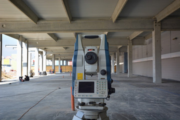 Surveyor equipment outdoors at construction site (total station)