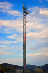 telecommunication tower against a beautiful sky. Cellular antenna on the tower