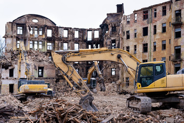 Building demolition and crashing by machinery for new construction