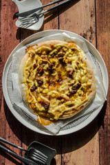 pizza on wooden table