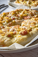 pizza on wooden table